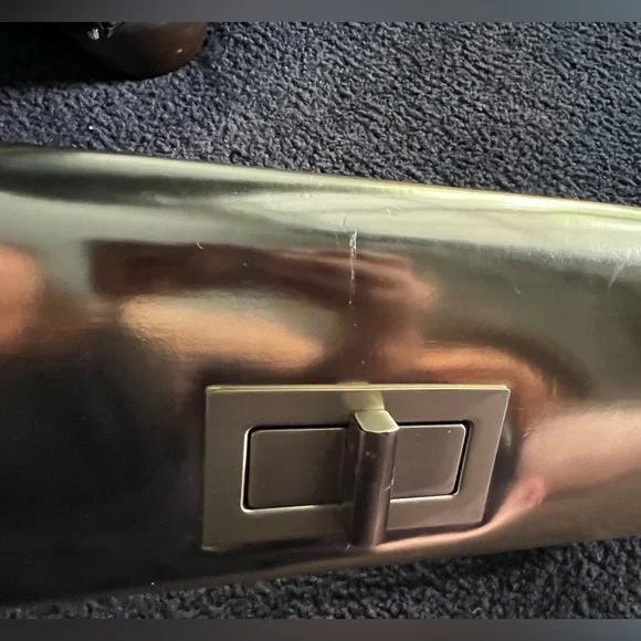 NWT - Olga berg gold clutch bag. NWT. Comes with chain strap. Rectangular clasp. - Picture 5 of 15